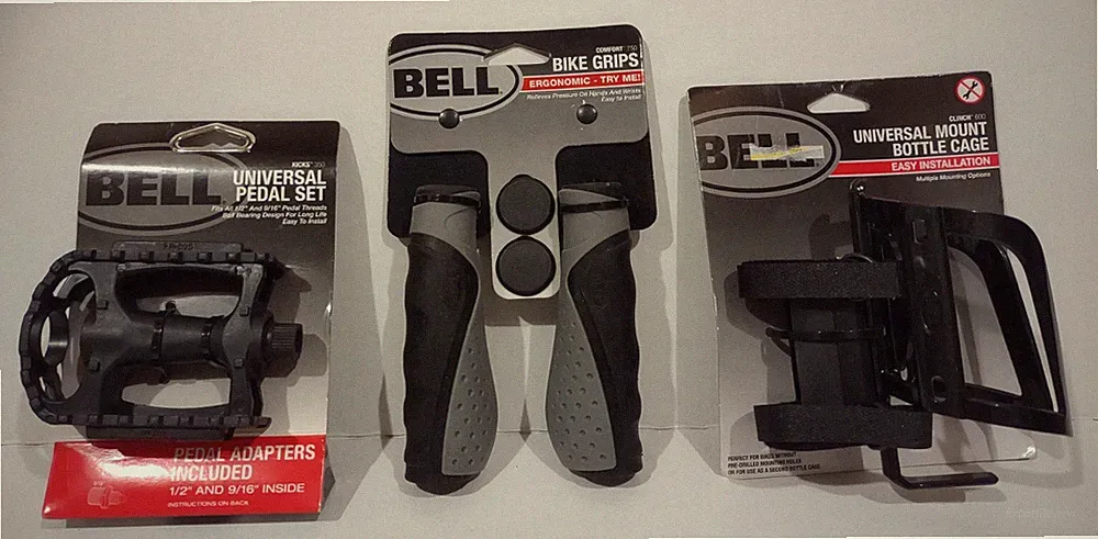 Bell Bicycle Bike Accessories Lot Of 3: Comfort Grips, Pedals, Bottle Cage Black